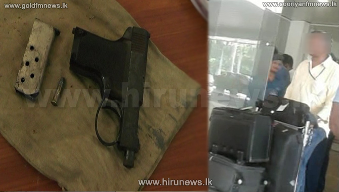 Fmr.+SLAF+pilot+arrested+at+BIA+with+a+firearm