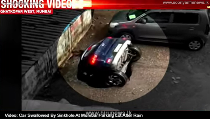 Car+swallowed+by+Sinkhole+at+Mumbai+parking+lot+after+rain+%28Video%29