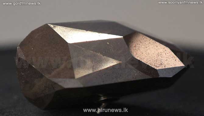 Billion-year-old+black+diamond+sold+for+%C2%A33.16m