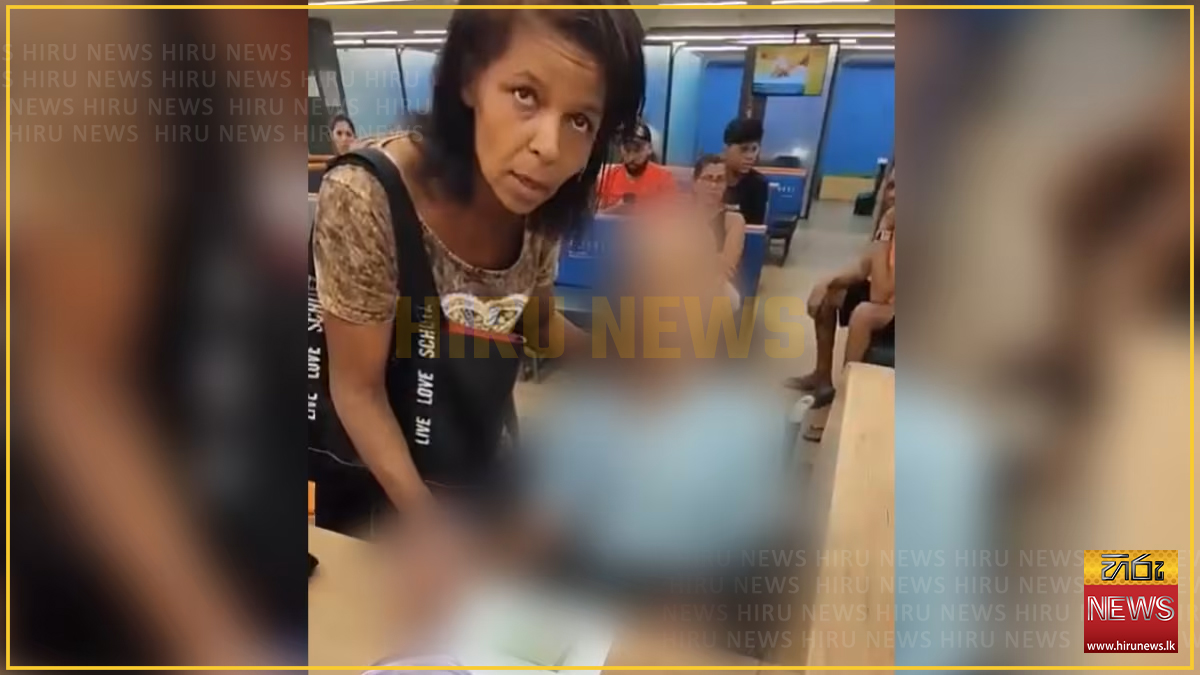 Woman wheels a CORPSE into a bank and tries to get him to 'sign off' a loan (Video)