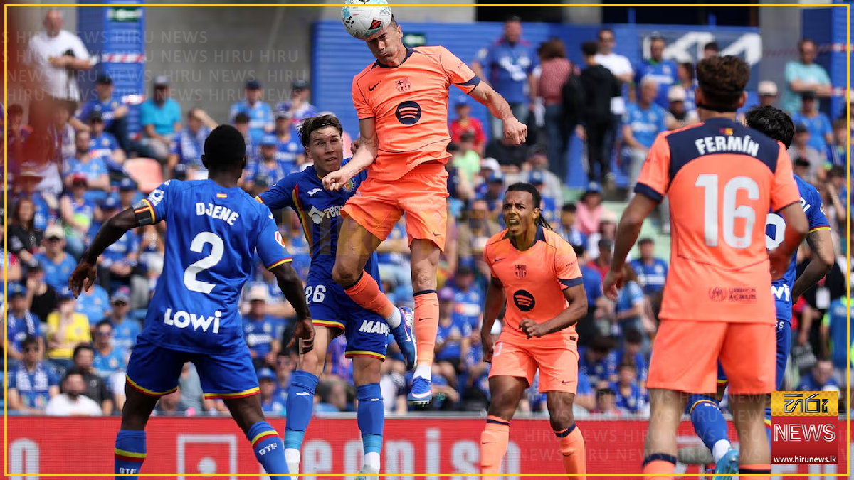 Barcelona march on towards title with 2-0 victory at Getafe