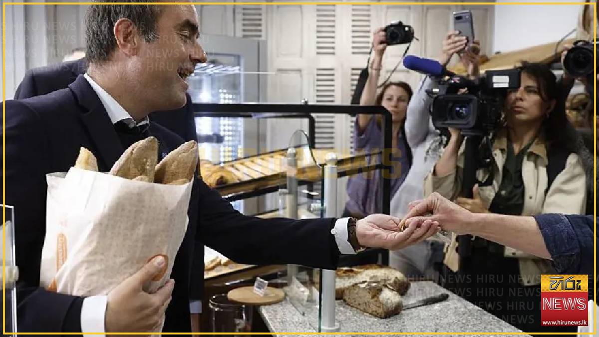 French PM fuels row with trip to buy baguettes