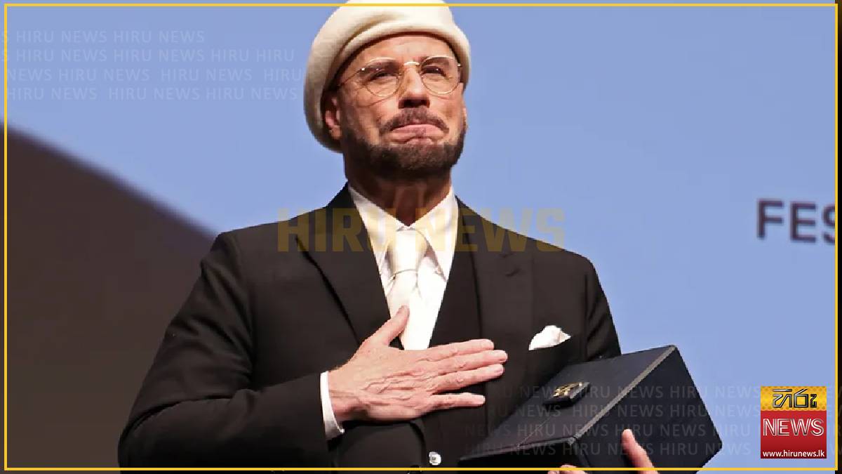 John+Travolta+receives+surprise+Palme+d%E2%80%99Or+at+Cannes