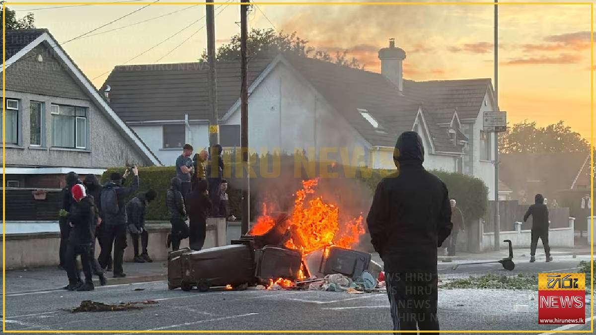 UK minister says violence in Northern Ireland is racist thuggery