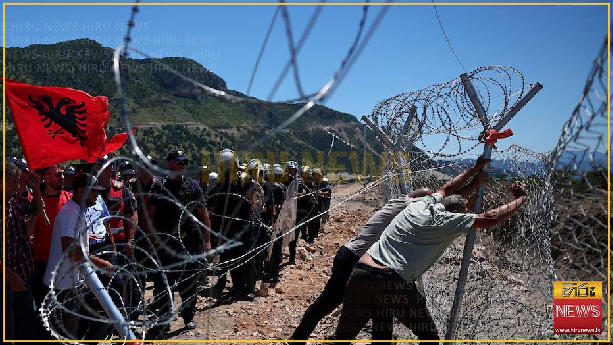 Protesters tear down Albanian development site fences