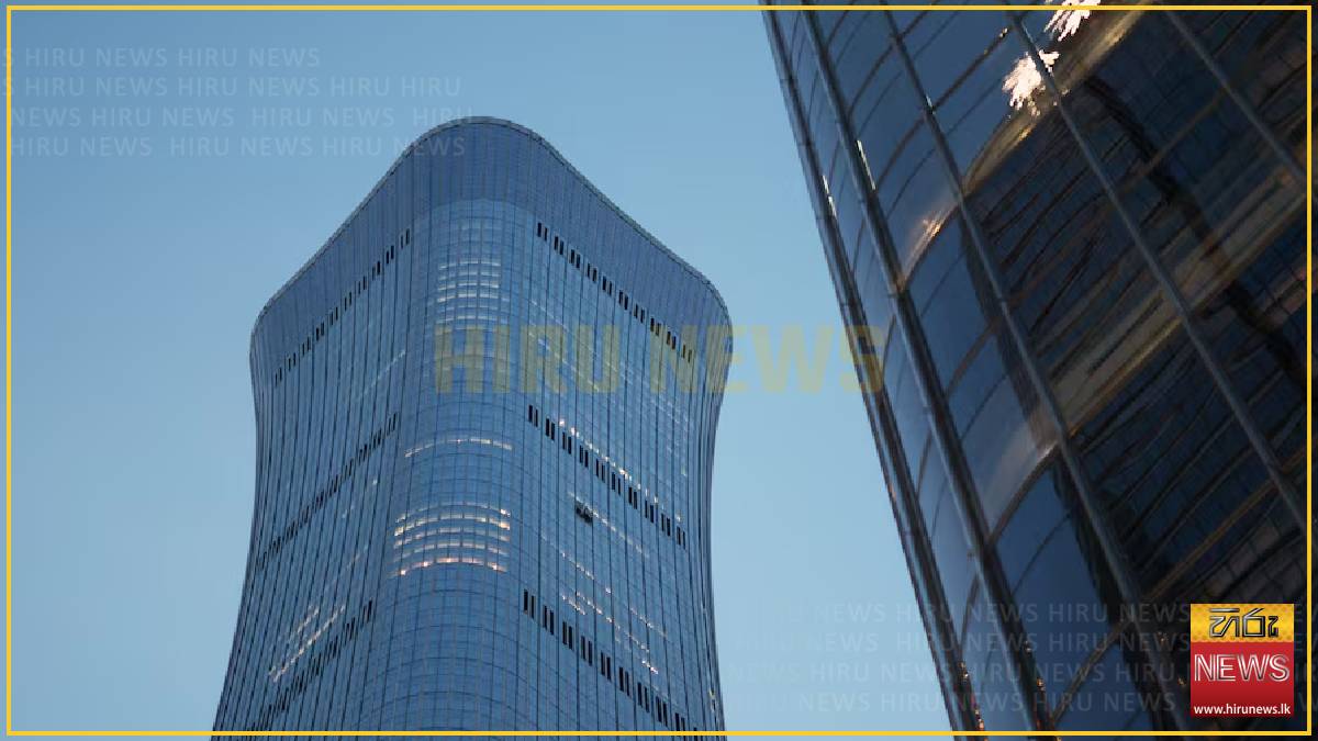 Small aircraft crashes into Beijing's tallest building