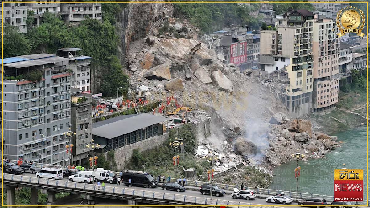 Chinese rescuers use explosives to clear boulders trapping landslide victims