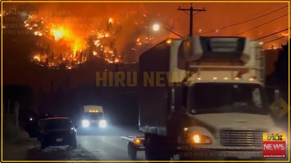 A fast-moving wildfire forces more than 20,000 people to evacuate in western Canada