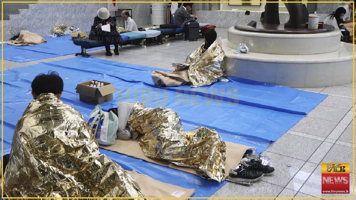 Thousands stranded at Japan's Narita airport after record rain kills four