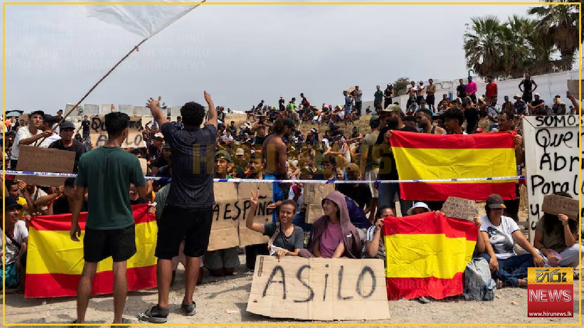 In Spain's Ceuta, hundreds of migrants stage protest and demand asylum