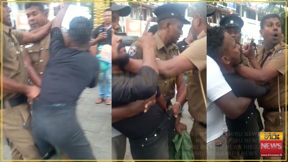 මහනුවර දළඳා පෙරහරේ රාජකාරියේ යෙදී සිටි පොලිස් නිලධාරීන්ට බැනවැදී බාධාකළ පුද්ගලයෙක් අත්අඩංගුවට