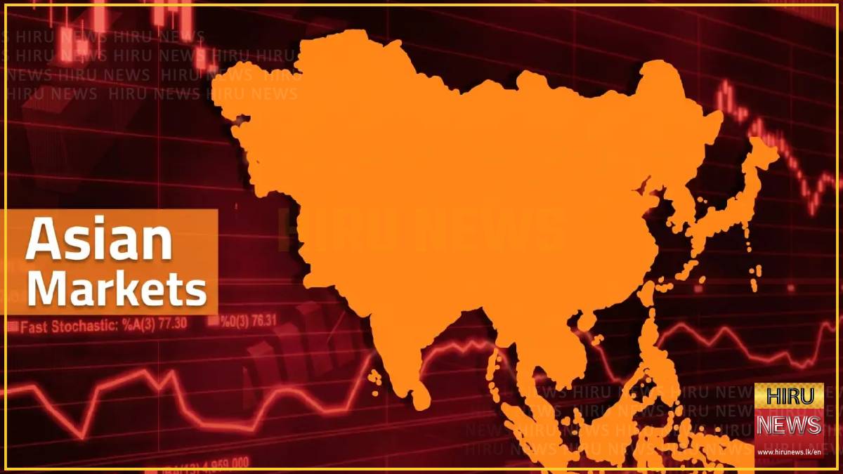 Shares skid in Asia as oil rises, rate hikes loom