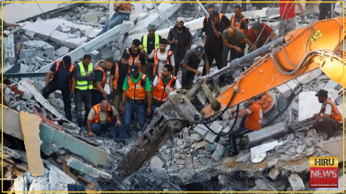 At least 50 children among 100 trapped in collapsed Gaza building