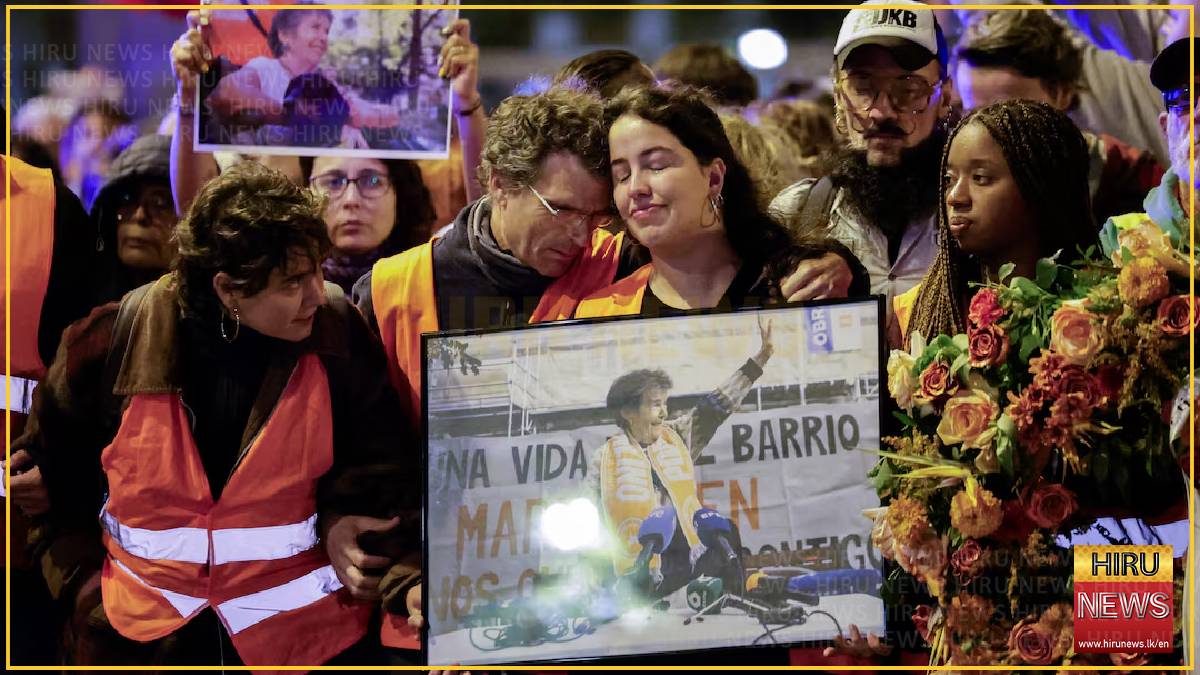 Thousands of Spaniards march to mark death of octogenarian at heart of housing protests