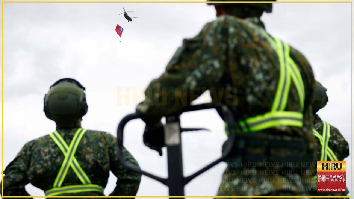 Giant Taiwan flag flies from helicopter for national day, defying Beijing